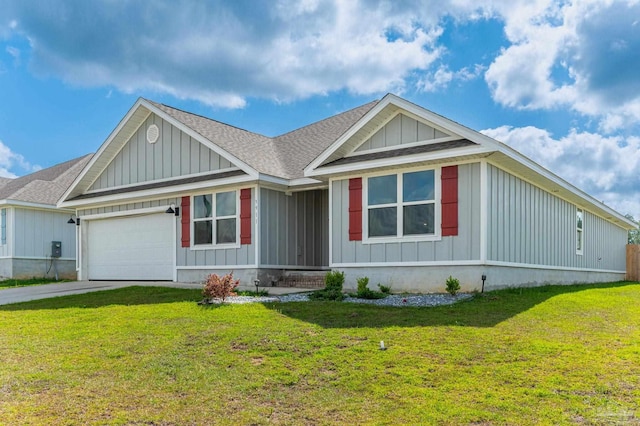 view of front of house featuring a garage and a front lawn