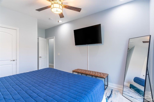 bedroom featuring ceiling fan, light wood finished floors, recessed lighting, and baseboards