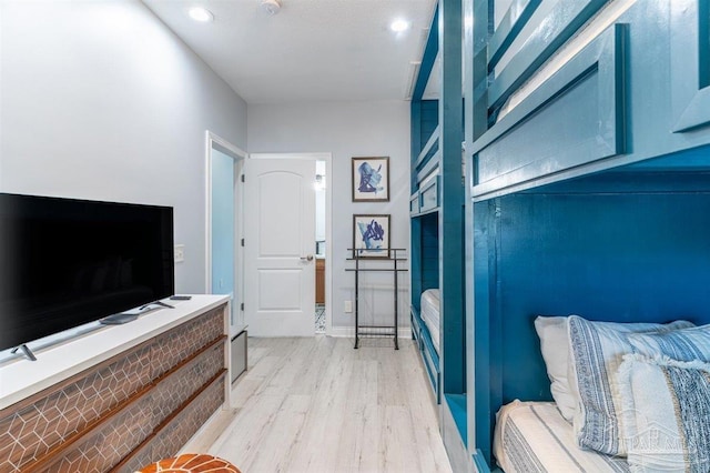 bedroom with light wood-type flooring