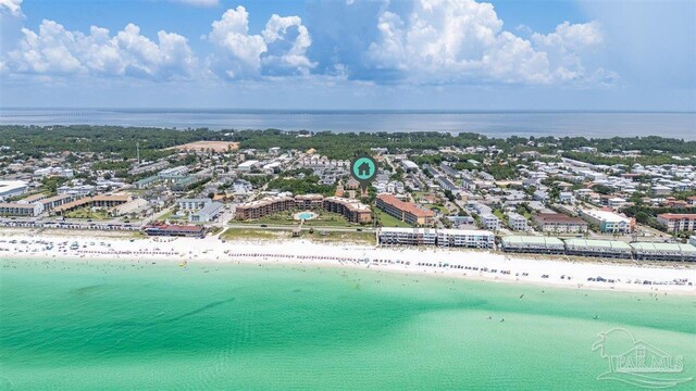 birds eye view of property featuring a view of the beach and a water view