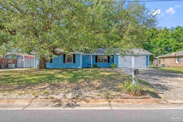 ranch-style home featuring driveway, central AC unit, a gate, a garage, and a front lawn