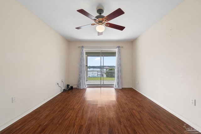 unfurnished room featuring ceiling fan and hardwood / wood-style floors