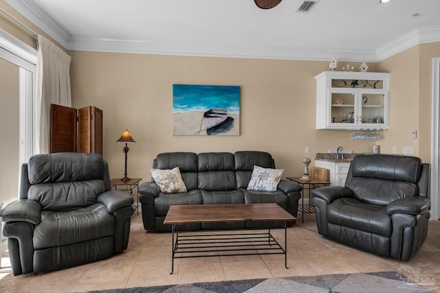 tiled living room with ornamental molding