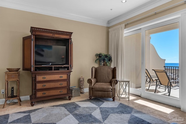 sitting room featuring ornamental molding