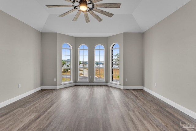 spare room featuring ceiling fan and hardwood / wood-style floors