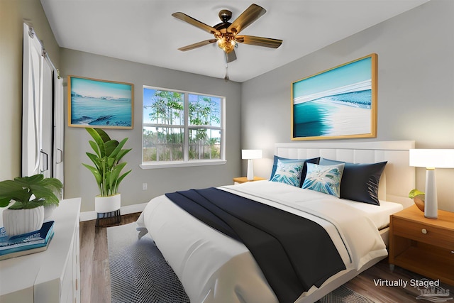 bedroom with wood-type flooring and ceiling fan