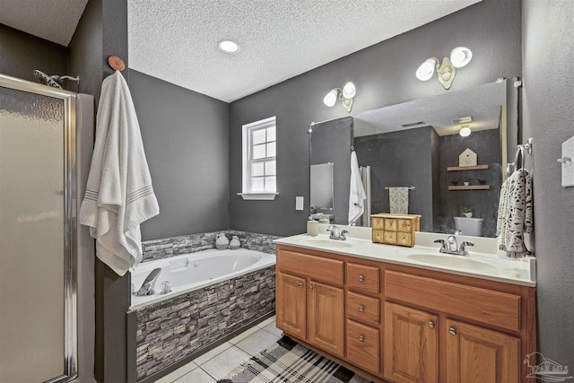 full bathroom featuring double vanity, a sink, a bath, and a shower stall