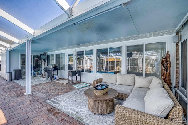 view of patio / terrace featuring an outdoor hangout area and a grill