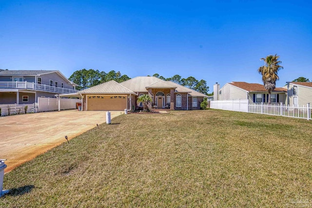 view of front facade with a garage, concrete driveway, fence, and a front lawn