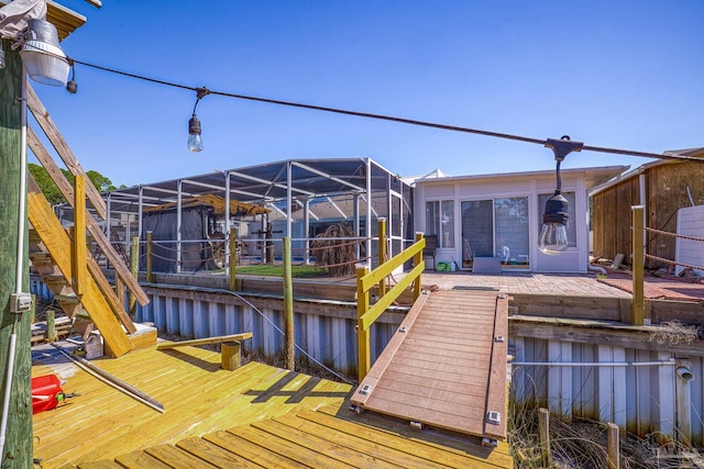 dock area featuring a water view and a lanai