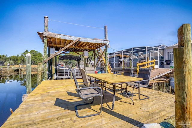 dock area with a water view