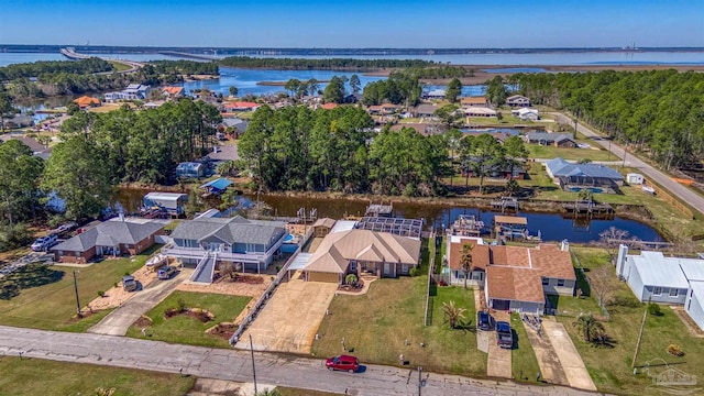 aerial view featuring a water view and a residential view