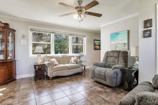 living room featuring ceiling fan, baseboards, crown molding, and tile patterned floors