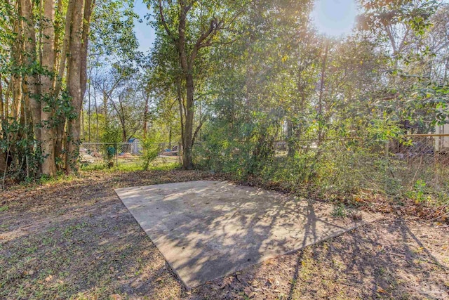 view of patio / terrace featuring fence