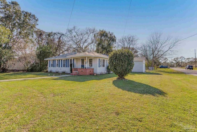 ranch-style home with a front yard