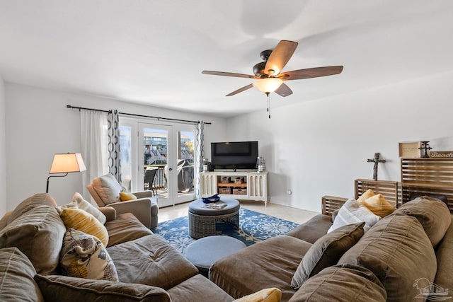 living room with ceiling fan, french doors, and light tile patterned floors