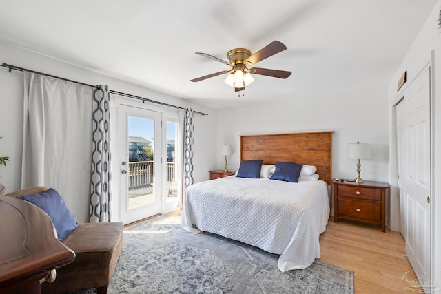 bedroom with ceiling fan, light wood-type flooring, and access to exterior