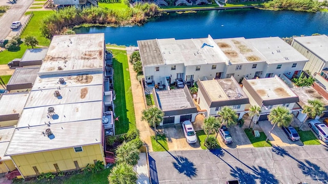 birds eye view of property featuring a water view