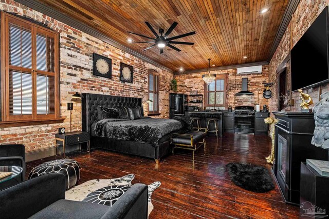 bedroom with wooden ceiling, hardwood / wood-style flooring, brick wall, ornamental molding, and a wall mounted air conditioner