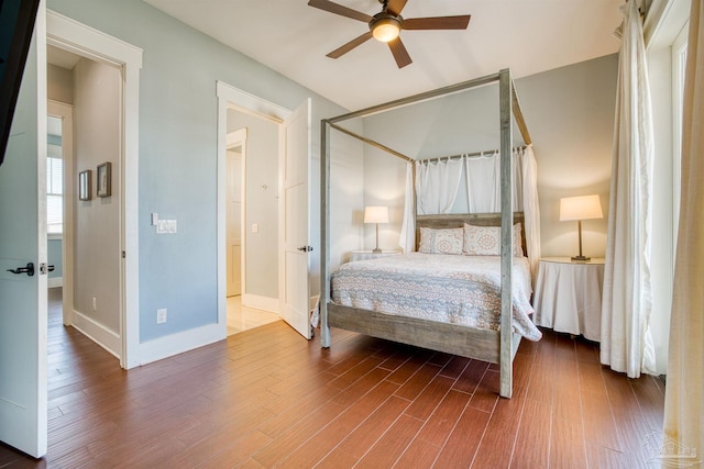 712 Maldonado Dr, Pensacola Beach, FL 32561 - bedroom with wood finished floors, baseboards, and ceiling fan