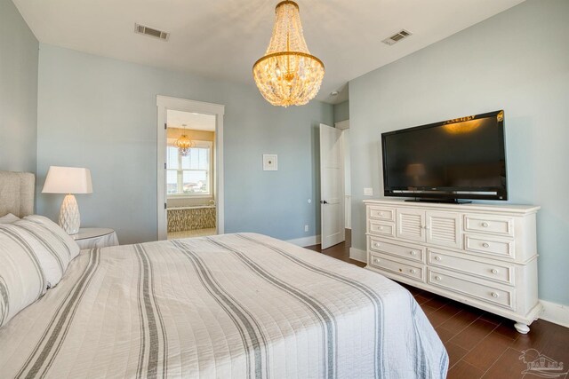 712 Maldonado Dr, Pensacola Beach, FL 32561 - bedroom featuring dark wood finished floors, a notable chandelier, baseboards, and visible vents