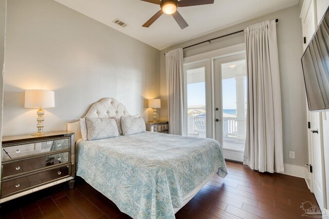712 Maldonado Dr, Pensacola Beach, FL 32561 - bedroom featuring visible vents, dark wood-type flooring, access to exterior, french doors, and ceiling fan