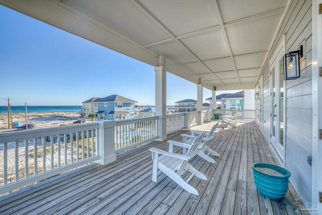 712 Maldonado Dr, Pensacola Beach, FL 32561 - wooden deck featuring a beach view and a water view