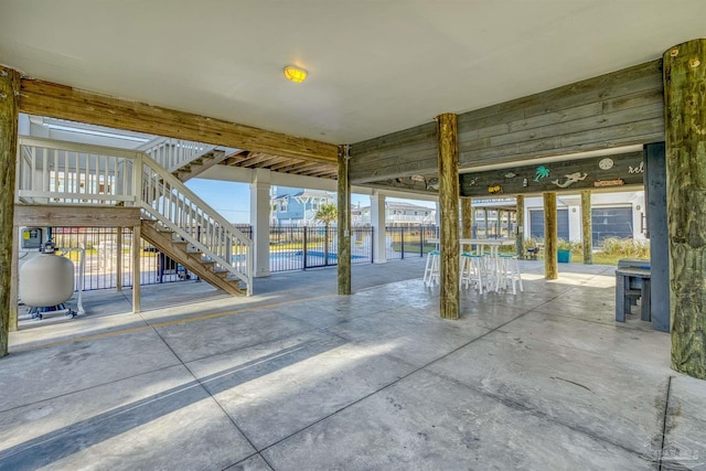 712 Maldonado Dr, Pensacola Beach, FL 32561 - view of patio featuring stairs and fence