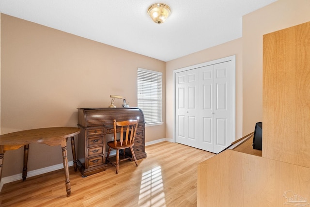 office space with hardwood / wood-style floors