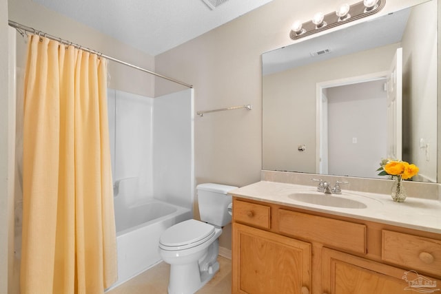 full bathroom with tile patterned flooring, shower / bath combination with curtain, a textured ceiling, toilet, and vanity