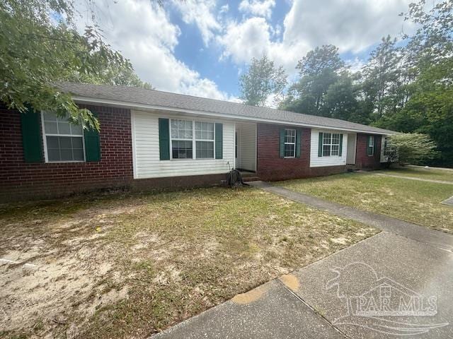 3031 Kingsfield Rd, Pensacola, FL 32514 - ranch-style house featuring brick siding and a front yard