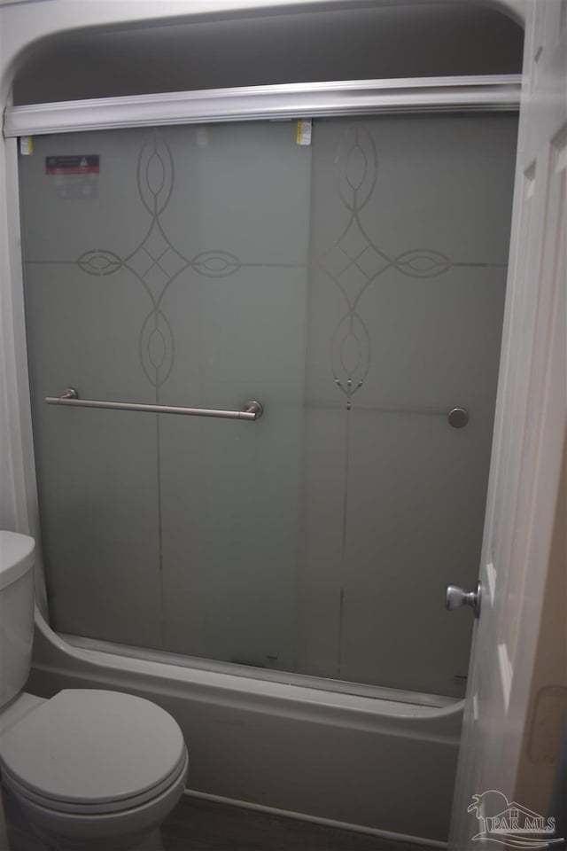 full bathroom featuring toilet