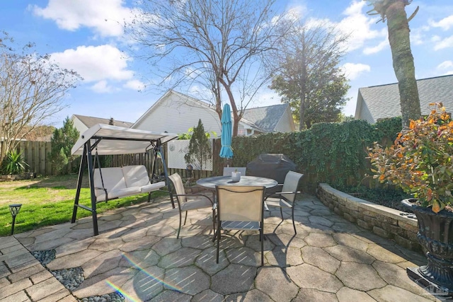 view of patio / terrace featuring a grill