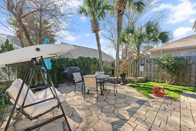 view of patio with a grill