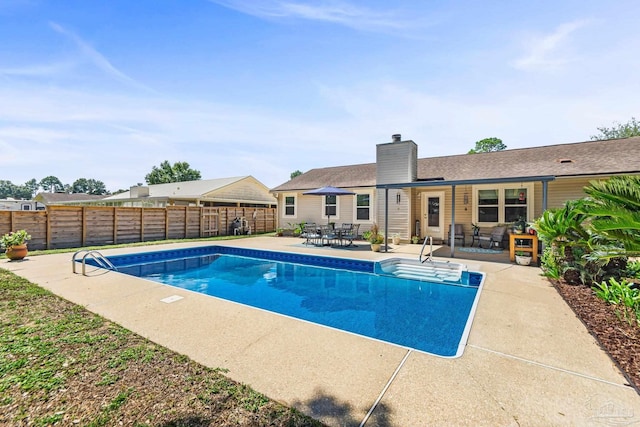 view of pool with a patio area