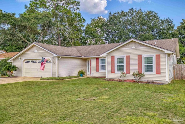 ranch-style home with a front lawn and a garage