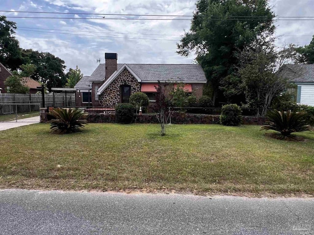 view of front facade featuring a front lawn, fence, and a chimney