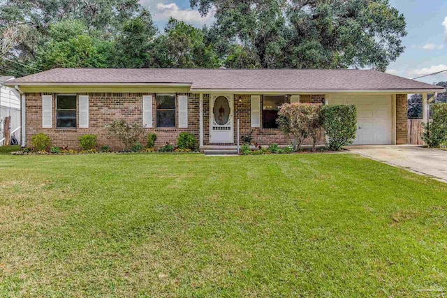 ranch-style house featuring a garage and a front lawn