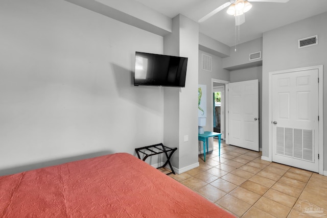 bedroom featuring ceiling fan and light tile patterned floors