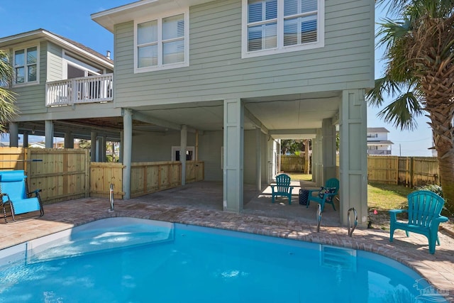 view of swimming pool featuring a patio