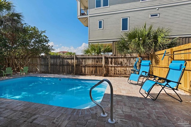 view of pool with a patio