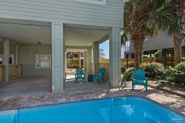 view of pool featuring a patio area