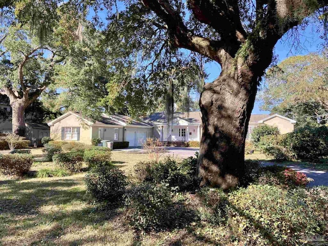 view of yard featuring a garage