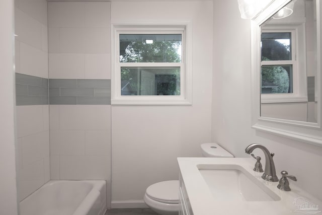 full bathroom featuring vanity, toilet, and  shower combination