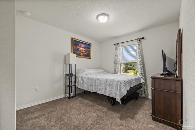 4327 Thistle Pine Ct, Pace, FL 32571 - carpeted bedroom featuring a textured ceiling and baseboards