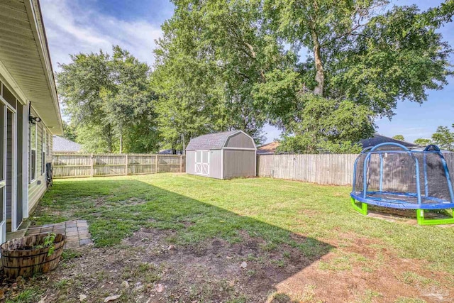 4327 Thistle Pine Ct, Pace, FL 32571 - fenced backyard with a trampoline and a shed