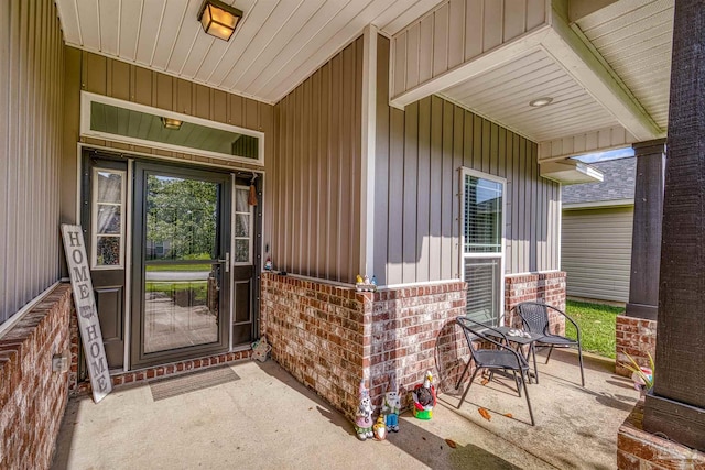 4327 Thistle Pine Ct, Pace, FL 32571 - property entrance featuring a porch and brick siding