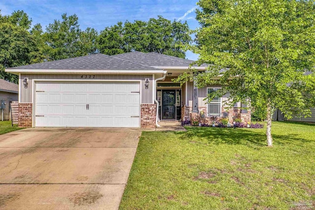 4327 Thistle Pine Ct, Pace, FL 32571 - view of front facade featuring an attached garage, driveway, a front yard, brick siding, and a shingled roof