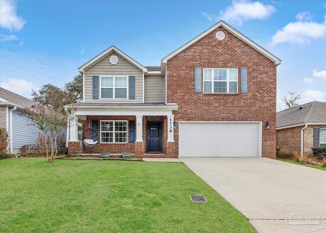 view of front of property featuring a garage and a front yard