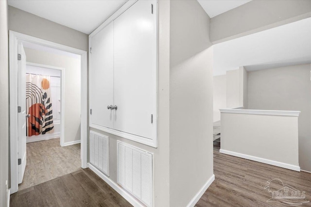 hall featuring dark hardwood / wood-style flooring